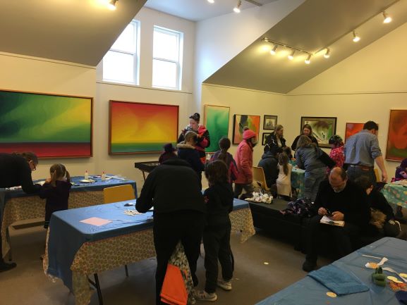 Families make easter crafts in the art gallery